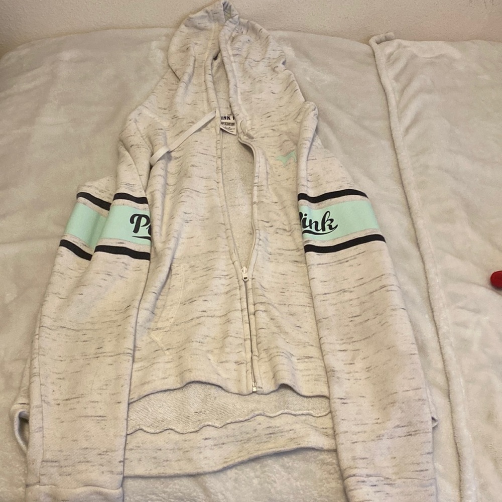 Comfy and only worn once. From Victoria secret has blue stripes on the arms.